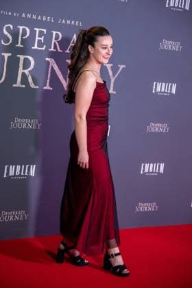 November 18, 2025, London, United Kingdom: A guest attends the London Premiere of Desperate Journey at Odeon Luxe Leicester Square. London United Kingdom - ZUMAs197 20251118_aaa_s197_263 Copyright: xLoredanaxSangiulianox