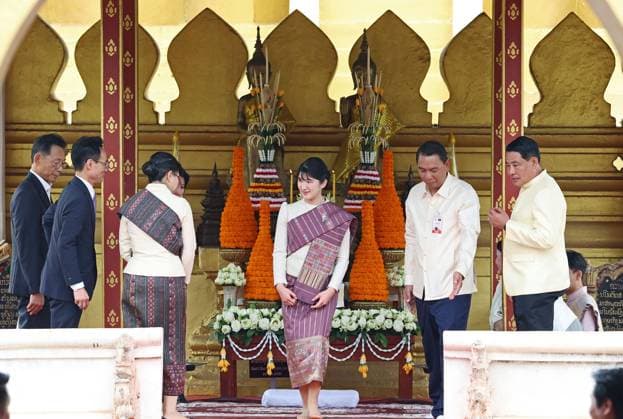 Japan Princess Aiko in Laos Japanese Princess Aiko (3rd from R), in Laotian traditional dress, visits Pha That Luang, or the Great Stupa, in Vientiane on Nov. 18, 2025, during her official trip to Laos. (Pool photo)  A14AA0005044099P
