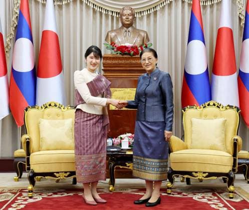 Japan Princess Aiko in Laos Japanese Princess Aiko (L), in Laotian traditional dress, shakes hands with Lao Vice President Pany Yathotou in Vientiane on Nov. 18, 2025, during her official trip to Laos. (Pool photo)  A14AA0005044107P