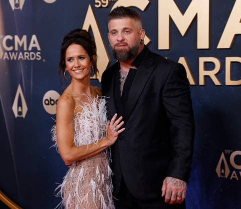 (L-R) Amber Cochran Gilbert and Brantley Gilbert arrive on the red carpet for the 59th CMA Awards in Nashville, Tennessee, on Wednesday, November 19, 2025.  NAS20251119145 JOHNxANGELILLO