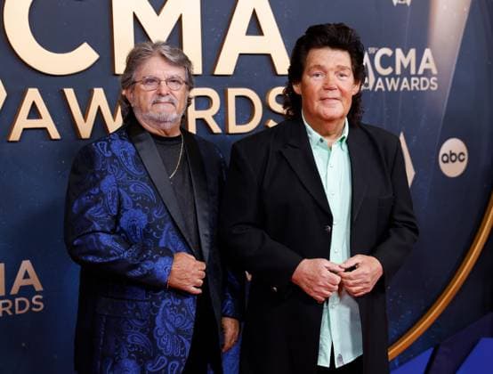(L-R) Mike McGuire and Marty Raybon arrive on the red carpet for the 59th CMA Awards in Nashville, Tennessee, on Wednesday, November 19, 2025.  NAS20251119152 JOHNxANGELILLO