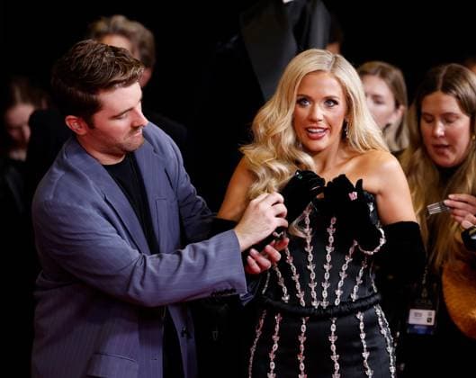 Megan Moroney arrives on the red carpet for the 59th CMA Awards in Nashville, Tennessee, on Wednesday, November 19, 2025.  NAS20251119224 JOHNxANGELILLO