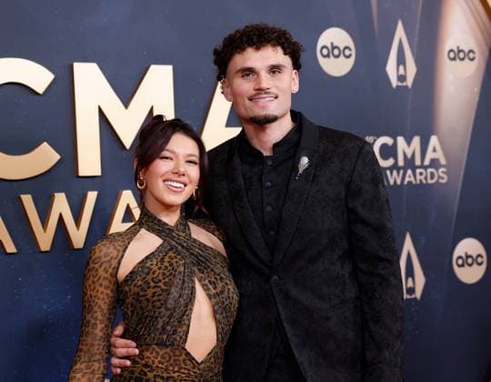 (L-R) Tianna Roblliard and Adrien Nunez arrive on the red carpet for the 59th CMA Awards in Nashville, Tennessee, on Wednesday, November 19, 2025.  NAS20251119255 JOHNxANGELILLO