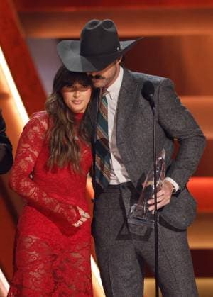 (L-R) Ella Langley and Riley Green accept the award for the Single of the Year for you look like you love me onstage during the 59th CMA Awards at the Bridgestone Arena in Nashville, Tennessee, on Wednesday, November 19, 2025.  NAS20251119264 JOHNxANGELILLO