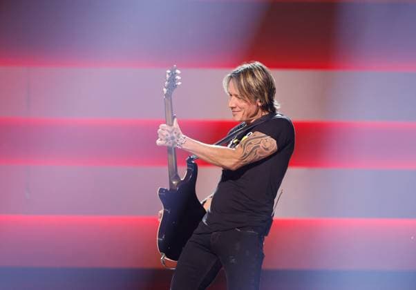 Keith Urban performs onstage during the 59th CMA Awards at the Bridgestone Arena in Nashville, Tennessee, on Wednesday, November 19, 2025.  NAS20251119288 JOHNxANGELILLO