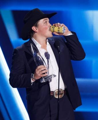 Zach Top accepts the award for New Artist of the Year onstage during the 59th CMA Awards at the Bridgestone Arena in Nashville, Tennessee, on Wednesday, November 19, 2025.  NAS20251119303 JOHNxANGELILLO