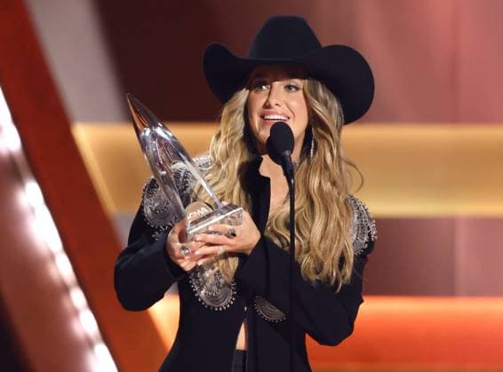 Lainey Wilson accepts the award for Female Vocalist of the Year onstage during the 59th CMA Awards at the Bridgestone Arena in Nashville, Tennessee, on Wednesday, November 19, 2025.  NAS20251119368 JOHNxANGELILLO