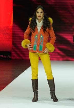 (251120) -- VANCOUVER, Nov. 20, 2025 -- A model presents a creation during the runway show at Vancouver Indigenous Fashion Week 2025 in Vancouver, British Columbia, Canada, Nov. 19, 2025. (Photo by Xinhua) CANADA-VANCOUVER-INDIGENOUS FASHION WEEK LiangxSen 