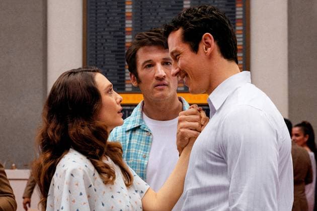 Elizabeth Olsen , Callum Turner and Miles Teller USA. Elizabeth Olsen , Callum Turner and Miles Teller in (C)A24 new movie: Eternity (2025). Plot: In an afterlife where souls have one week to decide where to spend eternity, Joan is faced with the impossible choice between the man she spent her life with and her first love, who died young and has waited decades for her to arrive. LMK106-J11425-201125 Supplied by LMKMEDIA. Editorial Only. Landmark Media is not the copyright owner of these Film or TV stills but provides a service only for recognised Media outlets. 