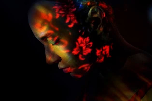 Surreal portrait with floral pattern illumination and dreamlike mood model released, Symbolfoto, AZF01016