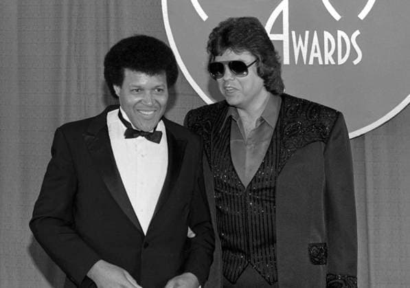 Chubby Checker and Ronnie Milsap at the 1982 American Music Awards January 25, 1982 Copyright: xRalphxDominguez MediaPunchx