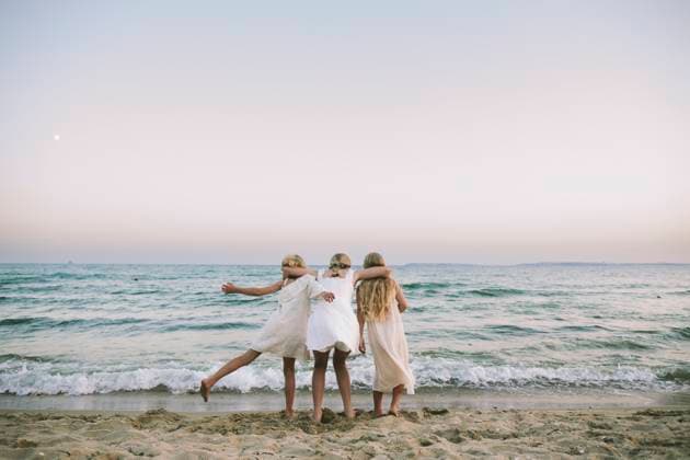 Friends embracing by the seaside expressing connection and joy model released, Symbolfoto, SIF01481