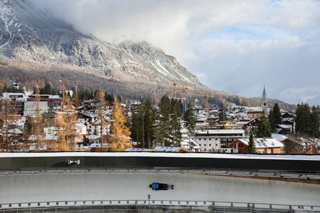 (251124) -- BEIJING, Nov. 24, 2025 -- A forerunner slides on the piste of Cortina Sliding Center in Cortina D Ampezzo, Italy, Nov. 21, 2025. Located in Italy s northern region of Veneto, Cortina d Ampezzo is famed for its beauty, ski resort and sporting legacy, beginning with the 1956 Olympic Winter Games and carrying through to Milan-Cortina 2026. ) XINHUA PHOTOS OF THE DAY LixJing 
