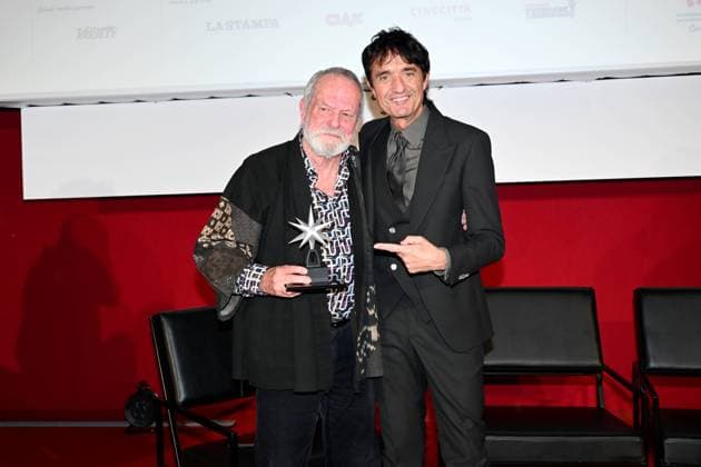 43rd Turin Film Festival 2025, Day 3 - Award ceremony of the Mole Stella to Terry Gilliam. In the photo: Terry Gilliam, Giulio Base  Copyright: xMaurizioxD Avanzox xipa-agency.netx xDxAvanzo xMangiarottix IPA_Agency_IPA68346938