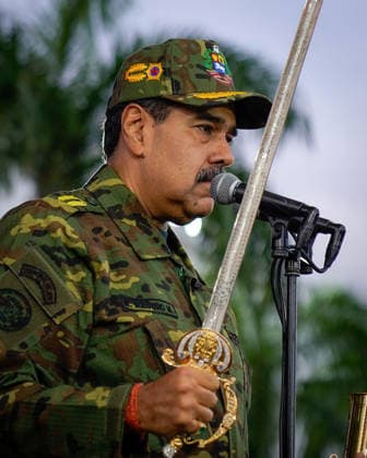 President of Venezuela Nicolas Maduro holds the Venezuelan independence hero Simon Bolivar s Sword of Peru during a military ceremony commemorating the 200th anniversary of the Venezuelan independence hero Simon Bolivar s Sword of Peru , in Caracas, Venezuela on Tuesday. November 25, 2025. The United States recently designated the Cartel De Los Soles (Cartel of The Suns) as a foreign terrorist organization, a group allegedly led by the president of Venezuela, Nicolas Maduro, and which, it is presumed, includes high-ranking members of the Venezuelan government.  VAN2025112611 VenezuelanxPresidentxOffice
