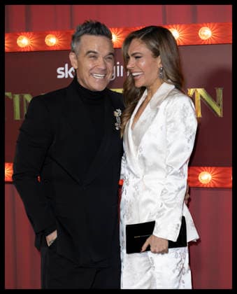 . 27 11 2025. London, United Kingdom. Robbie Williams and wife Ayda Field arriving at the Tinsel Town premiere in London.  xStephenxLockx xi-Imagesx IIM-26418-0041