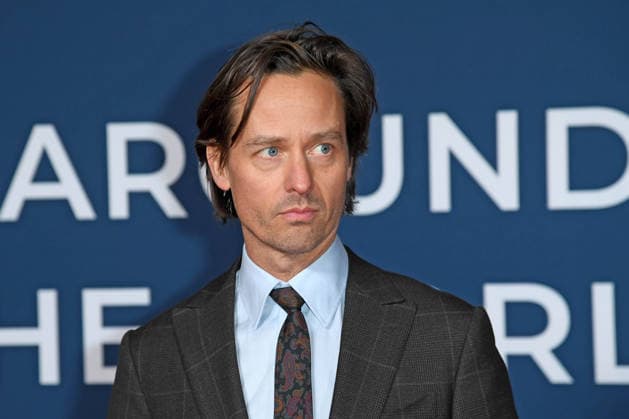 Entertainment Bilder des Tages Tom Schilling bei der Festival-Eröffnung von AROUND THE WORLD IN 14 FILMS im Kino in der Kulturbrauerei in Berlin am 28.11.2025