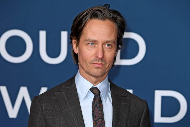 Tom Schilling bei der Festival-Eröffnung von AROUND THE WORLD IN 14 FILMS im Kino in der Kulturbrauerei in Berlin am 28.11.2025
