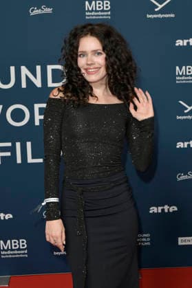 Marie Schnoell bei der Festivaleröffnung und der Premiere des Kinofilms Sentimental Value beim 20. Weltkinofestival Around the World in 14 Films im Kino in derKulturBrauerei. Berlin, 28.11.2025