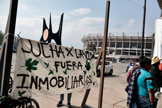 November 30, 2025, Mexico, Cdmx, Mexico: Seven months before the 2026 FIFA World Cup at Azteca Stadium (also known as Banorte Stadium) in Mexico City, residents of the Santa Ursula Coapa neighborhood remain in conflict with the government of Clara Brugada and President Claudia Sheinbaum. They allege that the renovation project has benefited the community by diverting water belonging to the town, most of which has been used for the stadium s renovation. Community groups and residents have painted a mural three times on the bridge leading to the stadium to express their opposition to the 2026 World Cup. However, the government has repeatedly covered the mural with a white tarp, heavy machinery, and police. The mural depicts discontent with Te - ZUMAp204 20251130_zip_p204_040 Copyright: xJosuexPerezx