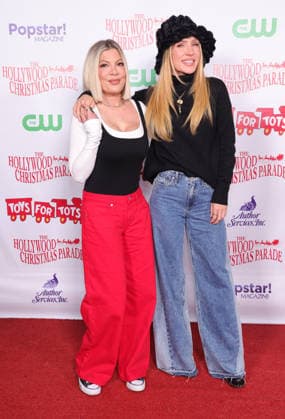 The 93rd Annual Hollywood Christmas Parade 30 November 2025 . Hollywood, California - Tori Spelling, Sharna Burgess At The 93rd Annual Hollywood Christmas Parade held at Hollywood Blvd in Hollywood., Credit:Sadou Faye Avalon United States, CA, Hollywood, Hollywood Blvd  Copyright: xSadouxFayex xAvalonx 1055782656