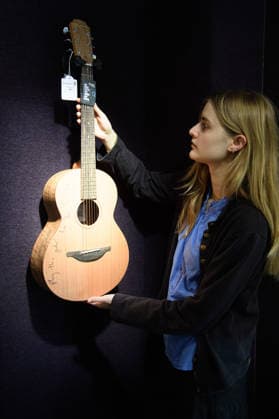 Bonhams Sound & Cinema: With Property from The Marianne Faithfull Estate Sale - Bonhams, London, UK - 1 December 2025 A staff member views A Signed Sheeran Lowden W01 Acoustic Guitar by Ed Sheeran (Â£2k - Â£3k) which is on auction at Bonhams Sound & Cinema: With Property from The Marianne Faithfull Estate Sale ending from 3rd December 2025 at Bonhams in London, England, UK on Monday 1 December, 2025., Credit:Justin Ng Avalon UK, England, London, Bonhams  Copyright: xJustinxNgx xAvalonx 1055809863