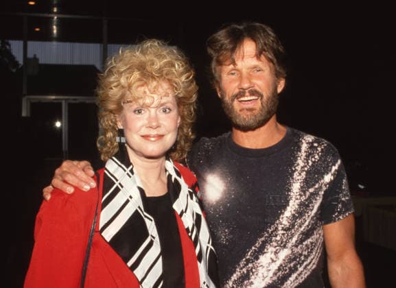 Elizabeth Montgomery and Kris Kristofferson at the screening of Cover Up: Behind the Iran-Contra Affair on June 24, 1988 at the Director s Guild Theater in Hollywood, California. Copyright: xRalphxDominguez MediaPunchx