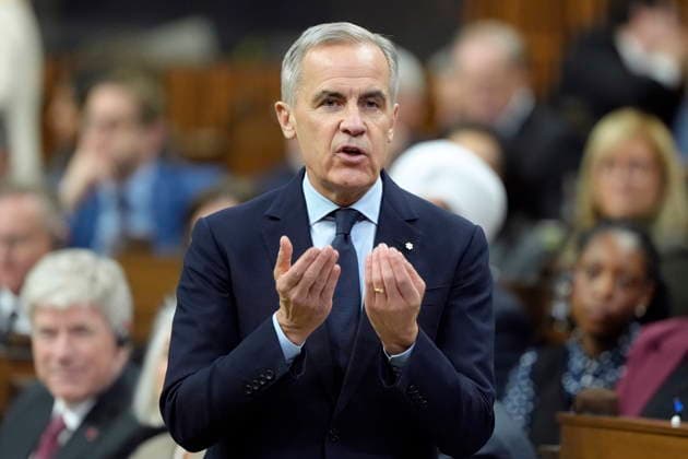 December 2, 2025, Ottawa, On, Canada: Prime Minister Mark Carney rises during Question Period on Parliament Hill in Ottawa, Tuesday, Dec. 2, 2025. Ottawa Canada  - ZUMAc35_ 20251202_zaf_c35_077 Copyright: xAdrianxWyldx