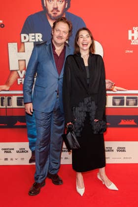 Premiere - Der Held vom Bahnhof Friedrichstrasse - Charly Hübner und Christiane Paul bei der Kinopremiere von Der Held vom Bahnhof Friedrichstrasse im Delphi-Filmpalast am 02.12.2025 in Berlin. Copyright: xEventpressxKochanx