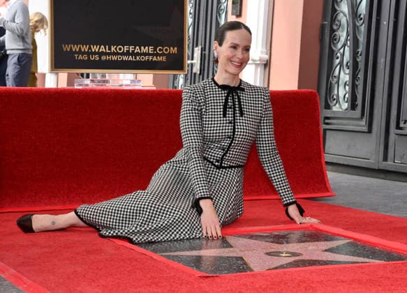 Actress Sarah Paulson (L) sits beside her star during an unveiling ceremony honoring her with the 2,829th star on the Hollywood Walk of Fame in Los Angeles on Tuesday, December 2, 2025.  LAP2025120208 JIMxRUYMEN