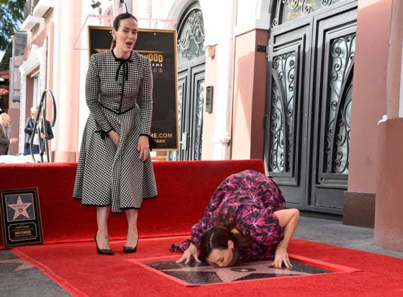 Actress Sarah Paulson (L) is joined by Carla Gallo during an unveiling ceremony honoring her with the 2,829th star on the Hollywood Walk of Fame in Los Angeles on Tuesday, December 2, 2025.  LAP2025120220 JIMxRUYMEN