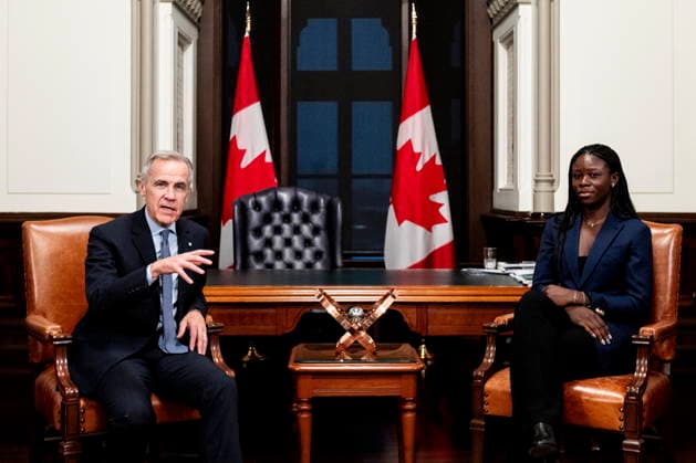 December 3, 2025, Ottawa, On, Canada: Prime Minister Mark Carney, left, speaks as he meets with Canadian tennis champion Victoria Mboko at his West Block office on Parliament Hill in Ottawa, on Wednesday, Dec. 3, 2025. Ottawa Canada  - ZUMAc35_ 20251203_zaf_c35_091 Copyright: xSpencerxColbyx