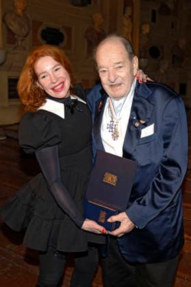 Ralph Siegel mit Ehefrau Laura Siegel bei der Auszeichnung mit dem Bayerischen Maximiliansorden durch den Ministerpräsidenten des Freistaates Bayern im Antiquarium der Münchner Residenz. München, 03.12.2025