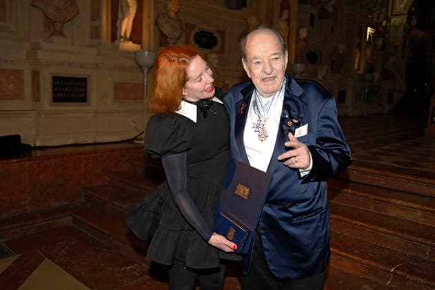 Ralph Siegel mit Ehefrau Laura Siegel bei der Auszeichnung mit dem Bayerischen Maximiliansorden durch den Ministerpräsidenten des Freistaates Bayern im Antiquarium der Münchner Residenz. München, 03.12.2025