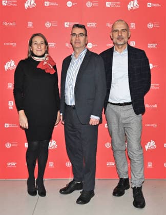 Milan, Italy Mick Herron receives the Raymond Chandler Award at the Noir in Festival with a masterclass at IULM. In the photo: Mick Herron, Valentina Garavaglia, Rector of IULM University, Fabio Vittorini, IULM professor.  Copyright: xNickxZonnax xipa-agency.netx xNickxZonnax IPA_Agency_IPA68737819
