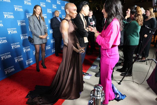 December 4, 2025, Santa Barbara, Ca, USA: Cynthia Erivo on the Red Carpet at the ritzy, oceanfront Ritz Carton Bacara resort for the Santa Barbara International Film Festival (SBIFF) fundraiser where she will be receiving the prestigious Kirk Douglas Award. Wicked director Jon Chu is being interviewed behind her. Santa Barbara USA - ZUMAk144 20251204_znp_k144_017 Copyright: xAmyxKatzx