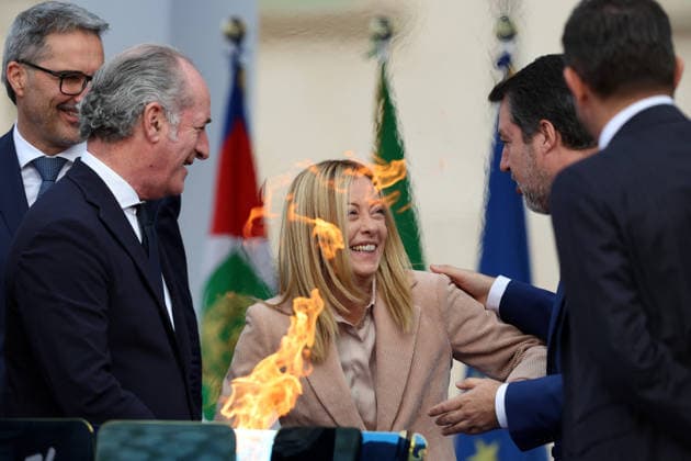 Milan Cortina 2026 Olympic Torch Relay Inauguration Ceremony - Rome Giorgia Meloni jokes with Matteo Salvini and Luca Zaia in front of the brazier. At the Quirinale Palace, President Sergio Mattarella and Prime Minister Giorgia Meloni inaugurated the Milan Cortina 2026 Olympic Torch Relay, officially launching the countdown to Italy s Winter Games. The ceremony highlighted tradition, national pride, and the global meaning of the Olympic flame in Rome, Italy on December 5, 2025. Photo by Marco Iacobucci IPA ABACAPRESS.COM Roma Italy  Copyright: xIacobuccixMarco IPA ABACAx