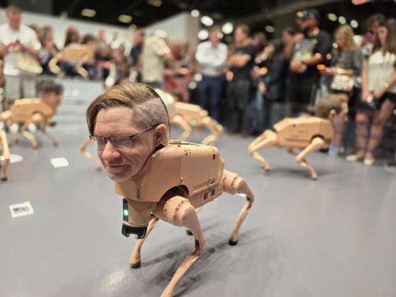 Photograph showing a robot dog with the face of American digital artist Beeple during a presentation at the Art Basel 2025 fair in Miami Beach, USA, 05 December 2025. Beeple released a pack of robotic dogs with hyper-realistic heads of tech moguls and art legends such as Elon Musk, Jeff Bezos, Andy Warhol, Pablo Picasso, and Mark Zuckerberg. Robotic dogs with the faces of Musk, Bezos, and Picasso steal the show at Art Basel !ACHTUNG: NUR REDAKTIONELLE NUTZUNG!  Copyright: xAlbertoxBoalx USA6972 20251206-55018752287_1