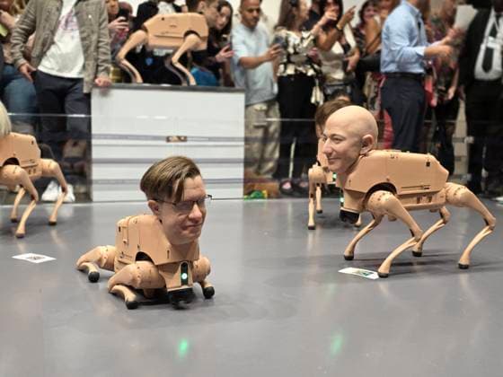 Photograph showing two robot dogs with the faces of artist Beeple (L) and entrepreneur Jeff Bezos (R) at the installation titled ‘Regular Animals’ at the Art Basel 2025 fair in Miami Beach, USA, 05 December 2025. American digital artist Beeple released a pack of robotic dogs with hyperrealistic heads of tech moguls and art legends such as Elon Musk, Jeff Bezos, Andy Warhol, Pablo Picasso, and Mark Zuckerberg. Robotic dogs with the faces of Musk, Bezos, and Picasso steal the show at Art Basel !ACHTUNG: NUR REDAKTIONELLE NUTZUNG!  Copyright: xAlbertoxBoalx USA6968 20251206-55018752284_1