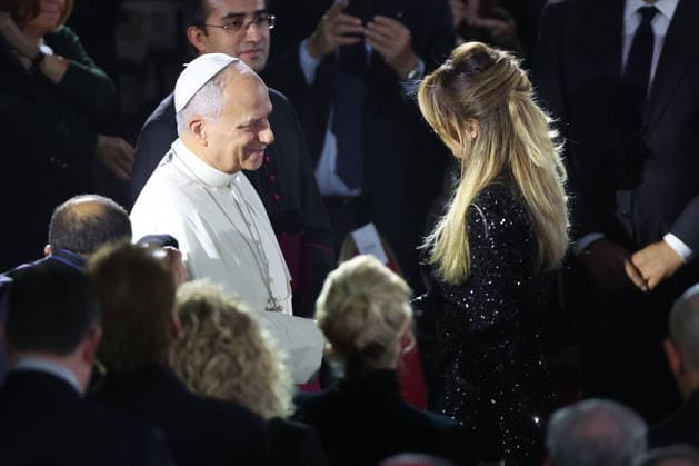 Vatican City, Italy - December 6, 2025: Pope Leo XIV blesses and greets Serena Autieri. Pope Leo XIV attends the concert for the poor featuring Canadian singer Michael Steven Buble and Serena Autieri, held in the Paul VI Hall in the Vatican.  Copyright: xmarcoxiacobuccix xipa-agency.netx xmarcoxiacobuccix IPA_Agency_IPA68835946