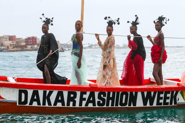 23rd Dakar Fashion Week held on fishing boats DAKAR, SENEGAL – DECEMBER 6: Models showcase designs aboard fishing boats off Ngor Island during the 23rd Dakar Fashion Week, organized by Senegalese-French designer Adama N’Diaye, founder of the brand Adama Paris, on December 6, 2025, in Dakar, Senegal. Cem Ozdel Anadolu Dakar Senegal. Editorial use only. Please get in touch for any other usage.  Copyright: x2025xAnadoluxCemxOzdelx