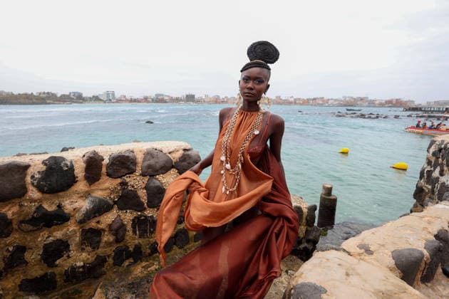 23rd Dakar Fashion Week held on fishing boats DAKAR, SENEGAL – DECEMBER 6: Models showcase designs aboard fishing boats off Ngor Island during the 23rd Dakar Fashion Week, organized by Senegalese-French designer Adama N’Diaye, founder of the brand Adama Paris, on December 6, 2025, in Dakar, Senegal. Cem Ozdel Anadolu Dakar Senegal. Editorial use only. Please get in touch for any other usage.  Copyright: x2025xAnadoluxCemxOzdelx