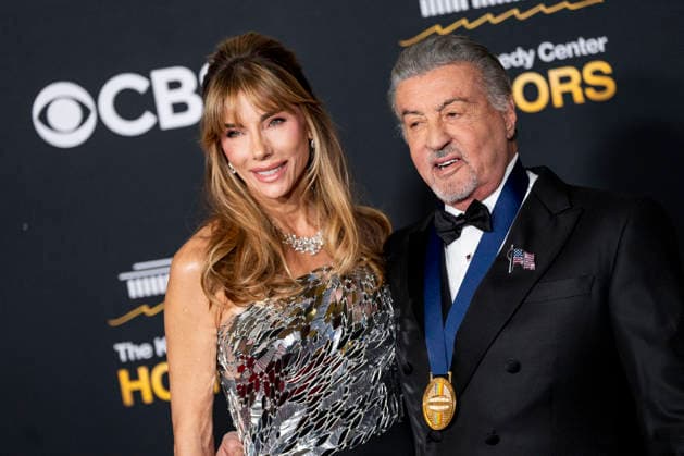 Kennedy Center Honoree Actor and Producer Sylvester Stallone and his wife, Jennifer Flavin Stallone, arrive on the red carpet for the 48th annual Kennedy Center Honors at the Kennedy Center in Washington DC on Sunday, December 7, 2025. President Donald Trump will host this year s event, which honors songwriter George Strait, actors Michael Crawford and Sylvester Stallone, singer Gloria Gaynor, and the rock band Kiss.  WAP20251207554 BONNIExCASH