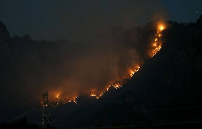 Forest fire on Mt. Myogi in eastern Japan Photo taken from Annaka in Gunma Prefecture, eastern Japan, shows a forest fire spreading on Mt. Myogi in the early hours of Dec. 9, 2025.  A14AA0005102305P