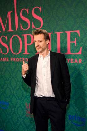 ABBberlin: Max von Pufendorf Schauspieler auf dem blauen Teppich bei der der Kino Premiere der Amazon prime Serie von MISS SOPHIE SAME PROCEDURE AS EVERY YEAR in Claerchens Ballhaus am 08.12.2025 Berlin Berlin Deutschland