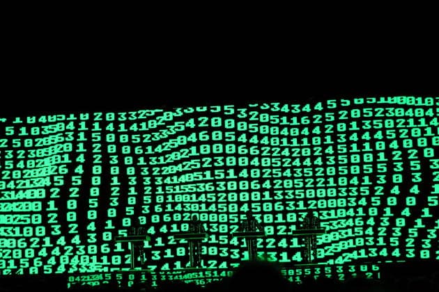 Ralf Hütter, Henning Schmitz, Falk Grieffenhagen und Georg Bongartz, v.l., von der Band Kraftwerk bei einem Konzert in der Uber Eats Music Hall in Berlin, 9. Dezember 2025. Kraftwerk Konzert Berlin