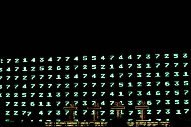 Ralf Hütter, Henning Schmitz, Falk Grieffenhagen und Georg Bongartz, v.l., von der Band Kraftwerk bei einem Konzert in der Uber Eats Music Hall in Berlin, 9. Dezember 2025. Kraftwerk Konzert Berlin