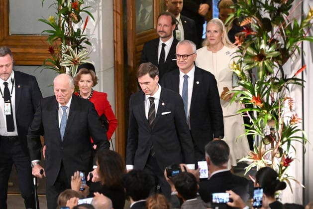 King Harald V of Norway, Queen Sonja of Norway, Jorgen Watne Frydnes, chair of the Norwegian Nobel Committee, Magnus Haakon, the Crown Prince of Norway, and Crown Princess Mette-Marit of Norway attend the 2025 Nobel Peace Prize presentation ceremony at Oslo City Hall on December 10, 2025 in Oslo, Norway  OSL202510232 PAULxTREADWAY