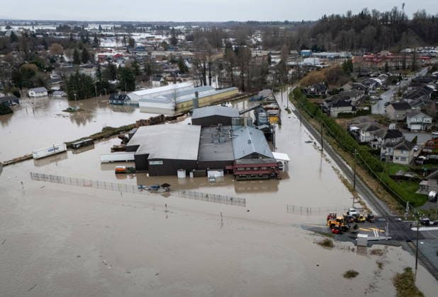 December 11, 2025, Vancouver, Bc, CANADA: Enviro-Corp Recycling is pictured flooded near the Sumas border crossing in Abbotsford B.C., on Thursday, December 11, 2025. Vancouver CANADA  - ZUMAc35_ 20251211_zaf_c35_054 Copyright: xEthanxCairnsx