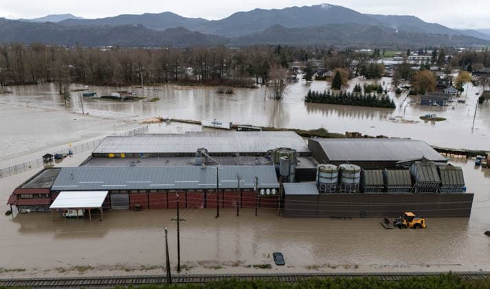 December 11, 2025, Vancouver, Bc, CANADA: Enviro-Corp Recycling is pictured flooded near the Sumas border crossing in Abbotsford B.C., on Thursday, December 11, 2025. Vancouver CANADA  - ZUMAc35_ 20251211_zaf_c35_055 Copyright: xEthanxCairnsx